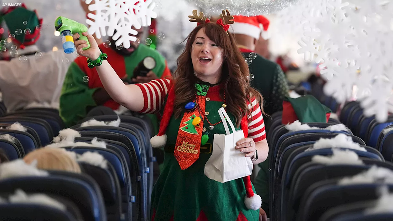 Flight takes kids to visit Santa at North Pole scene in transformed Denver airport hangar