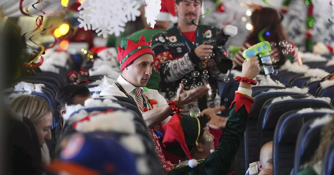 Flight takes kids to visit Santa at North Pole scene in transformed Denver airport hangar