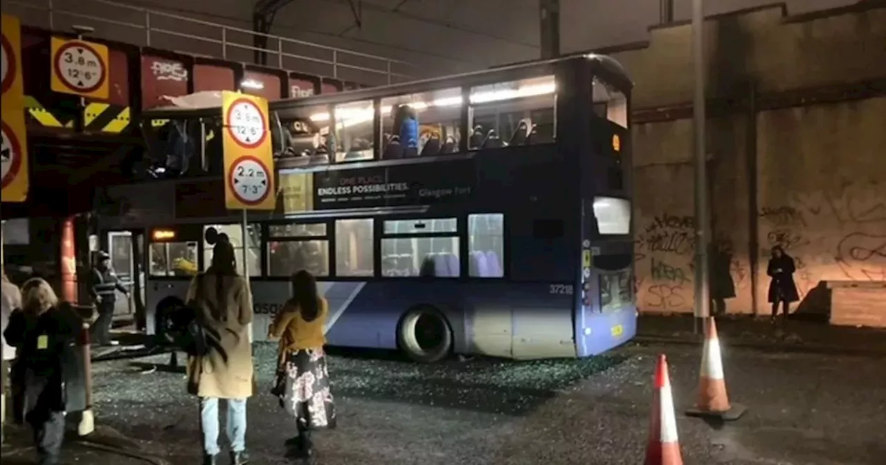 Eight injured in Glasgow railway bridge bus crash as one left fighting for life