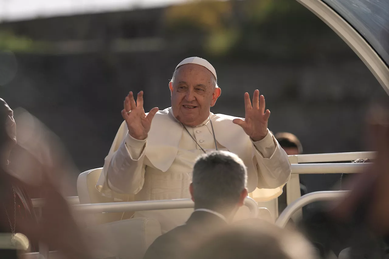 Pope Francis makes 1st papal visit to France's Corsica awash in expressions of popular piety