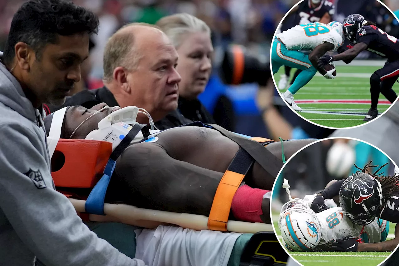 Dolphins' Grant DuBose stretchered off field, taken to hospital after big hit in frightening scene