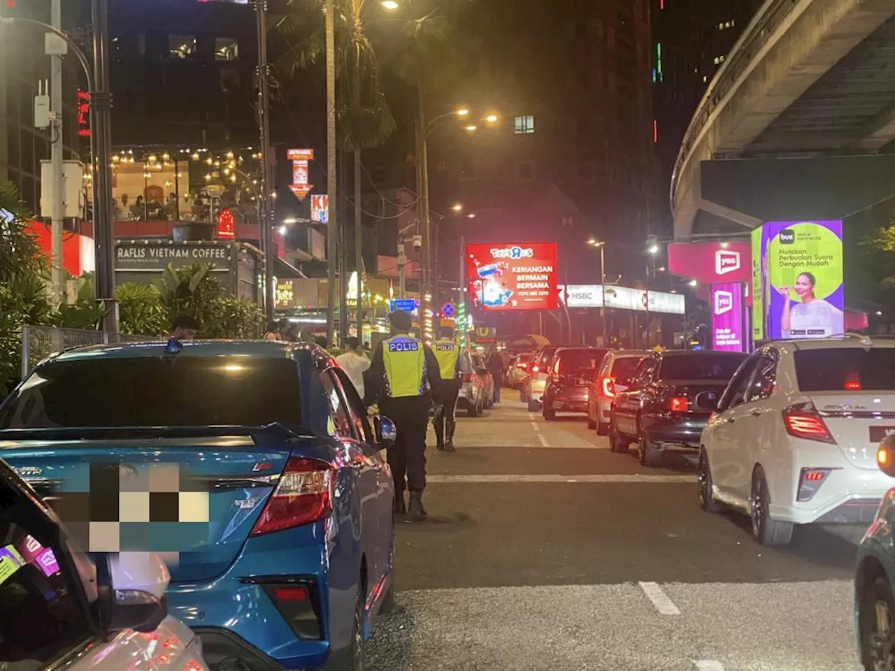 Cops issue over 100 traffic summonses during Bukit Bintang joint ops