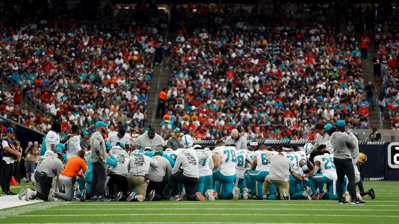 NFL stars pray on field as Miami Dolphins wide receiver taken to hospital after scary hit...