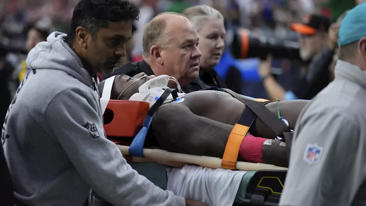 Miami WR DuBose taken off the field on a stretcher after hit to the head against Texans