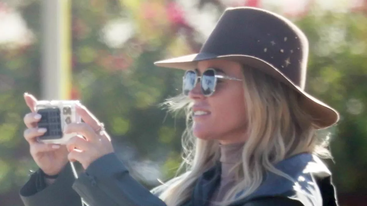 Teddi Mellencamp pictured with her horse trainer amid affair scandal as they attend her...