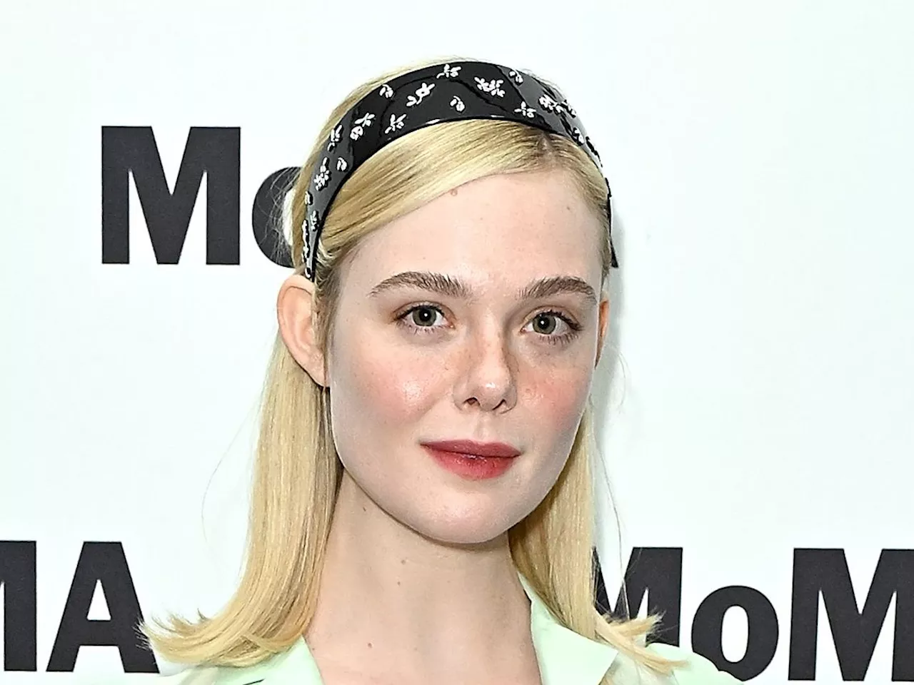 Elle Fanning's Holiday-Ready Headband Is So Blair Waldorf-Coded