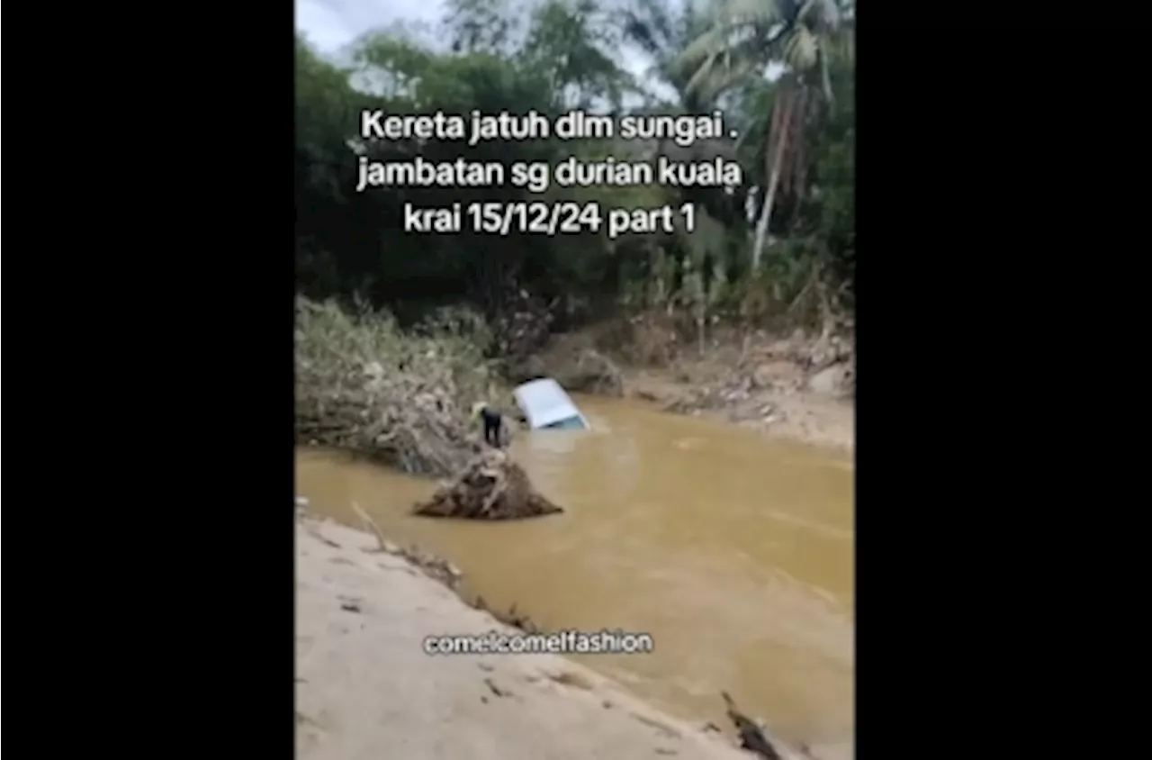 Traumatised but safe: Kelantan cops rescue man after car skids and plunges into Sg Durian in Kuala Krai (VIDEO)