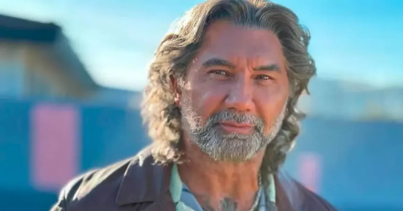 Hollywood muscleman unrecognisable with long grey hair and beard