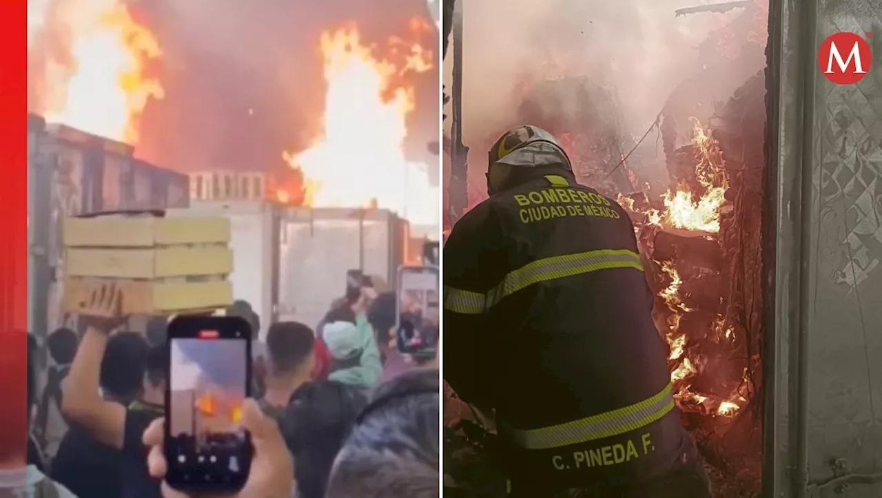 Incendio consume cajas de tráileres en Central de Abasto de CdMx en Iztapalapa