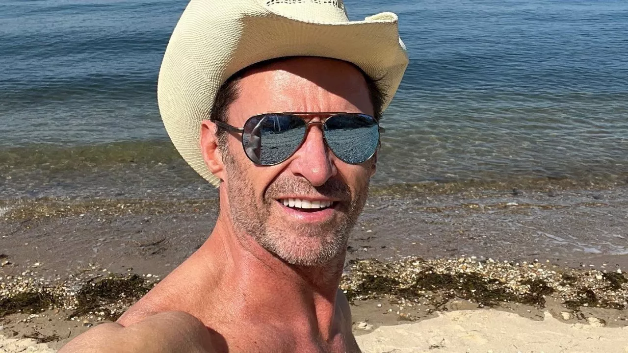 Hugh Jackman spotted in Bondi with adopted kids, mystery man