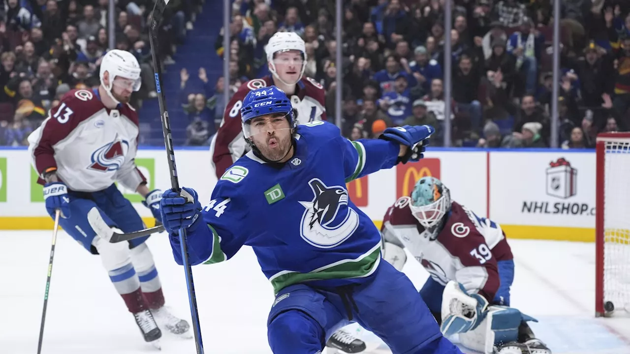 Kiefer Sherwood has 1st NHL hat trick as Canucks beat Avalanche 3-1