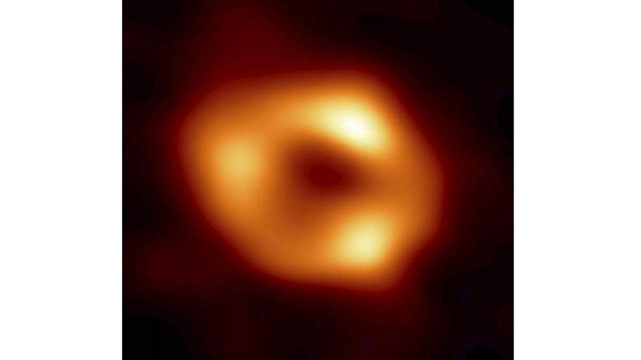 Two Stars Orbiting Milky Way's Supermassive Black Hole