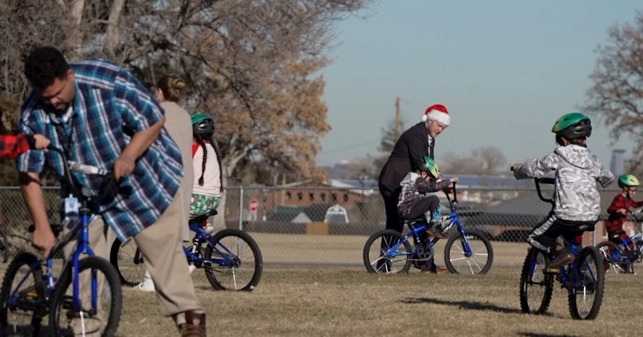 HCA HealthONE Swedish employees build bikes to surprise Englewood second graders