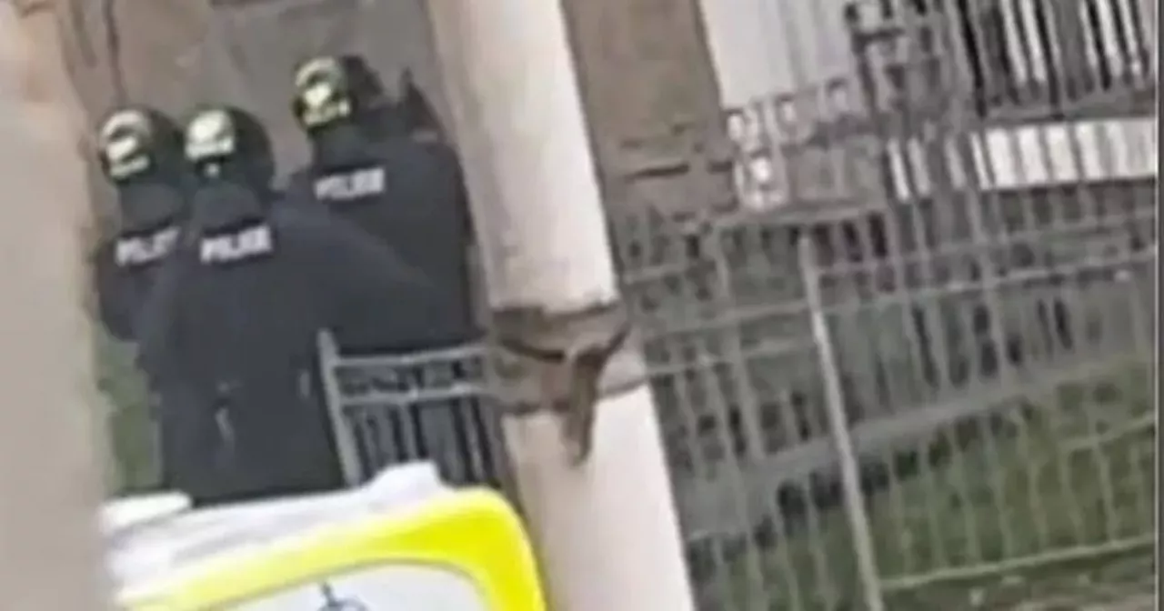 Man Throws Petrol Bombs From Balcony During Standoff With Police