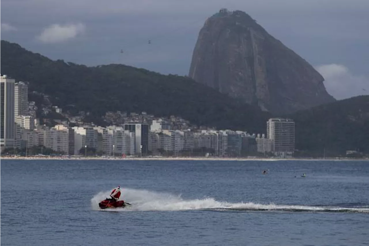 Firefighter Santa Brings Joy to Rio de Janeiro Beachgoers