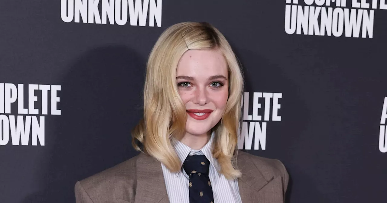 Elle Fanning Revives the Neck Tie Trend In an ’80s Power Suit