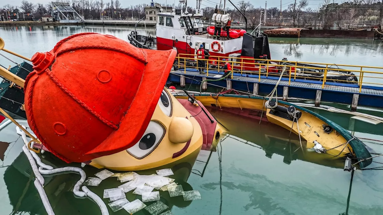 Life-Size Theodore Tugboat Partially Sunk in Ontario Port