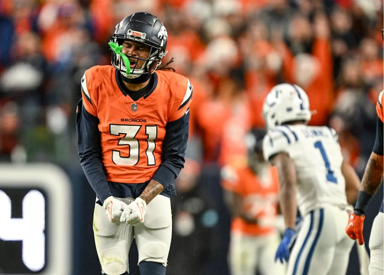 Broncos Clinch Playoff Spot With Win Over Colts