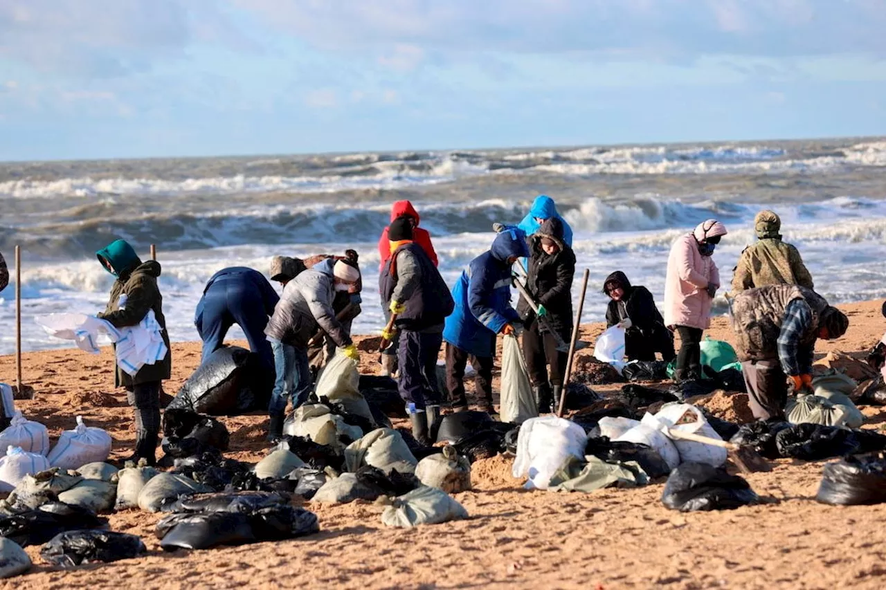 Thousand of volunteers help with cleanup efforts after oil spill along Russia’s Black Sea shoreline