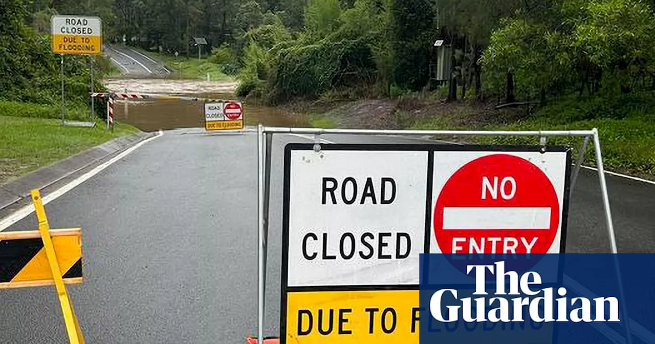 Two Rescued as Queensland Floods, Bushfires Burn Elsewhere