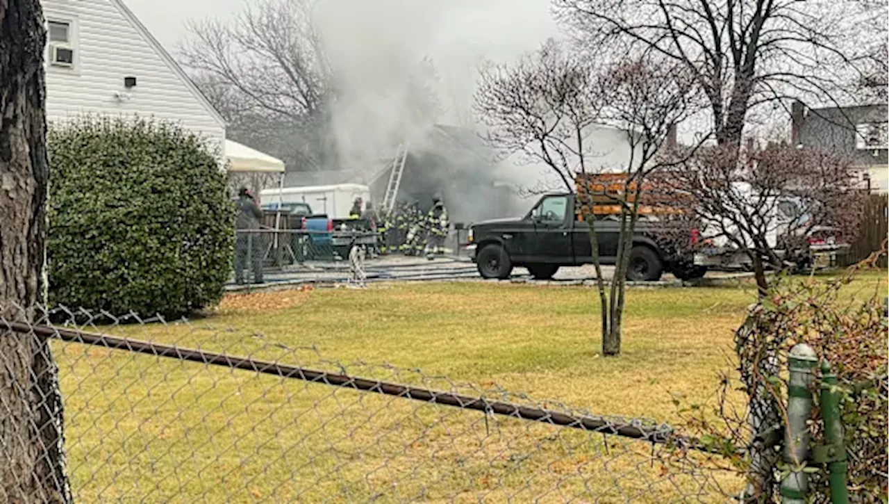 First responders prevent garage fire from spreading in Huntington Station