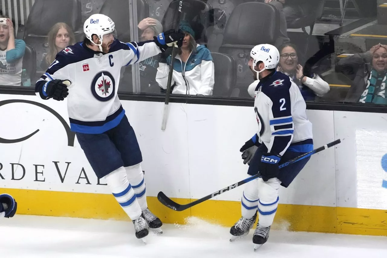 Jets rally past Sharks in late scoring flurry