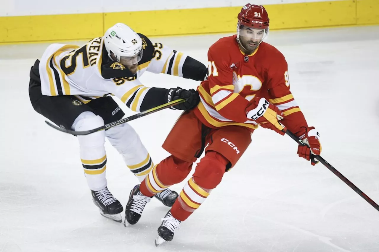 Bruins Overcome Flames in Overtime Thriller