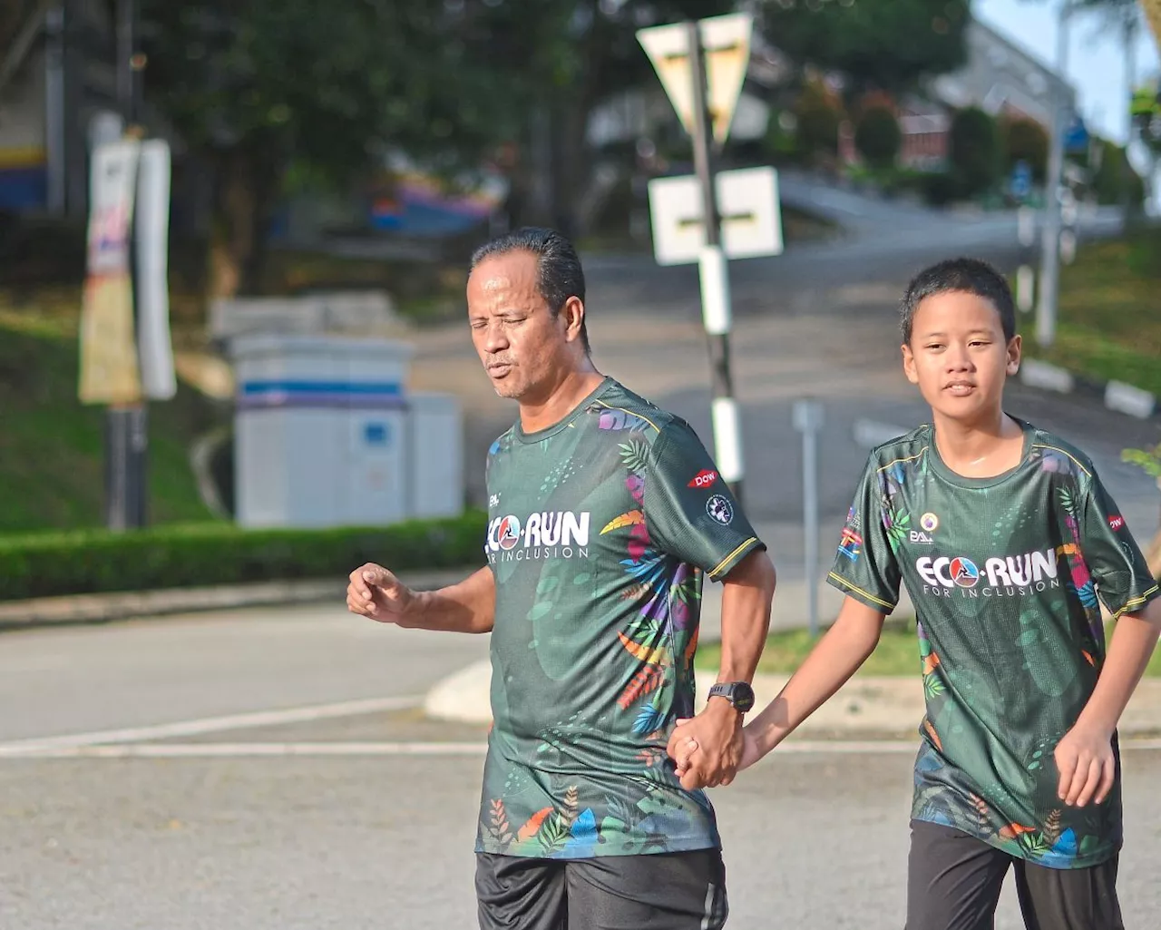 Father Runs With Autistic Son To Help Him Develop Social Skills