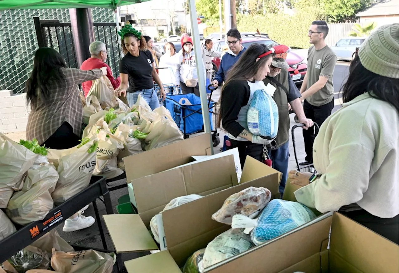 In Arleta, free turkeys and holiday hams are given to those in need