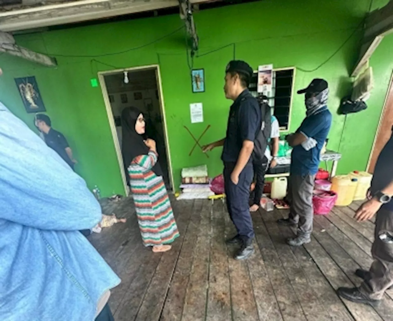 Sabah police deny widow of slain cop was ‘threatened’ during demolition operations