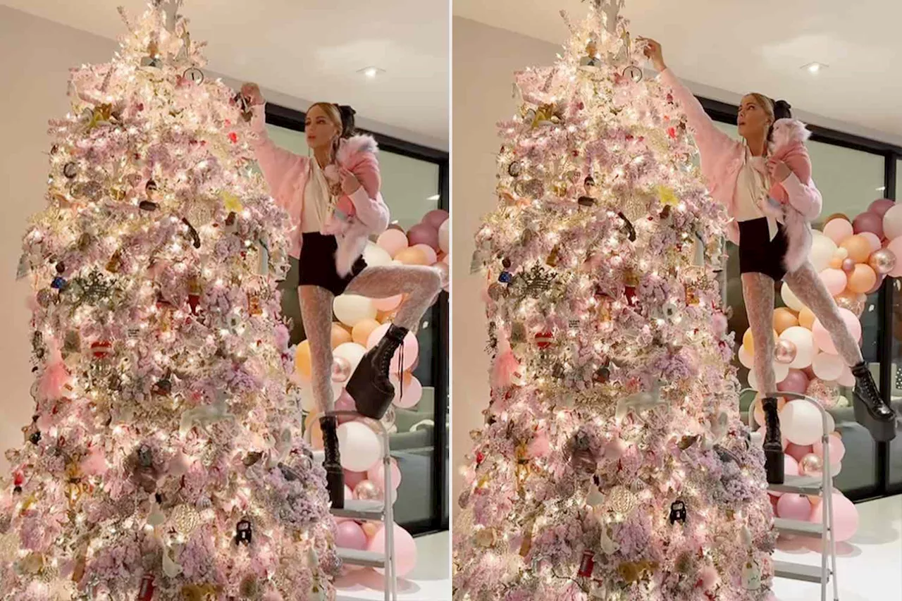 Kate Beckinsale's Festive Balancing Act Involves a Three-Step Ladder and a Cat