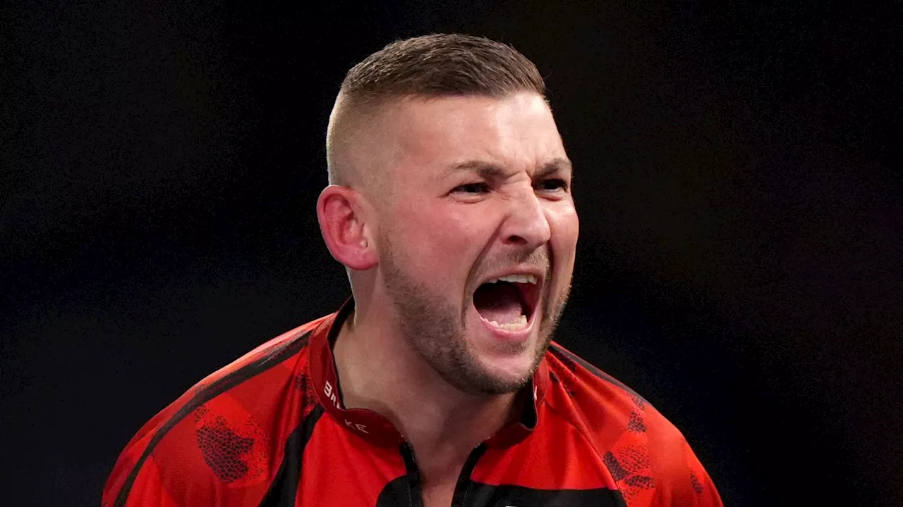 World Darts Championship: Nathan Aspinall earns nervy win as Christian Kist hits nine-darter in defeat