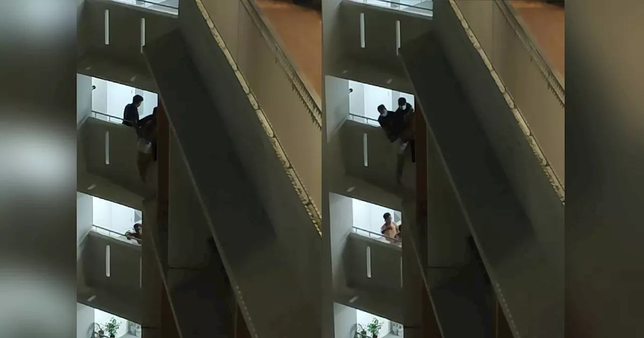 Rescuers Save Woman Dangling from HDB Block