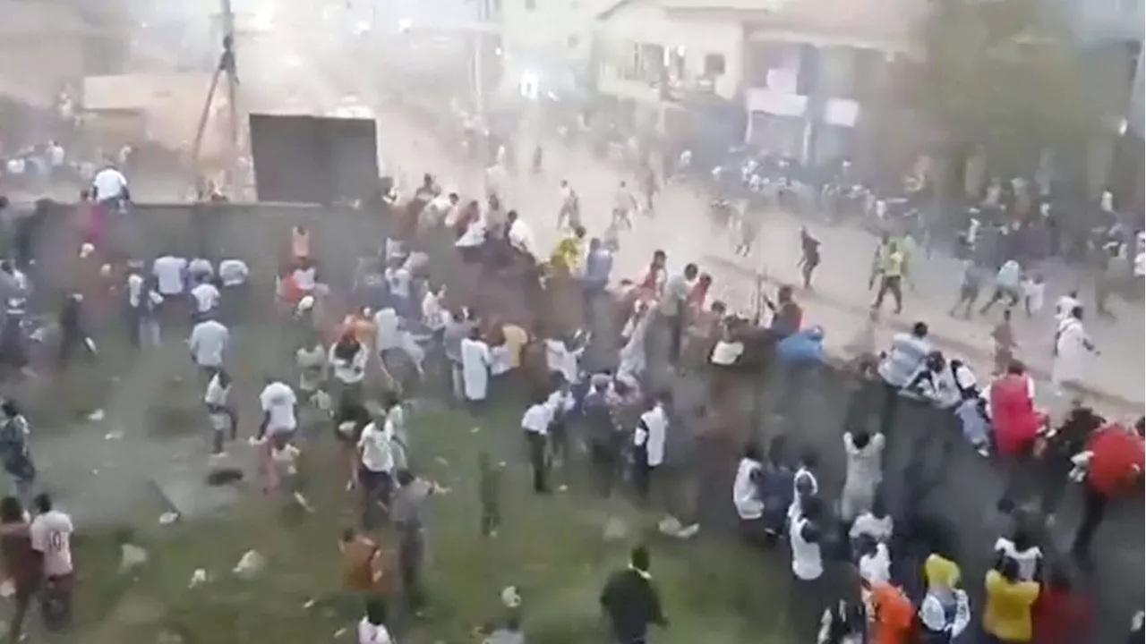 Guinea stadium stampede kills 56 people following clashes at soccer match, authorities say