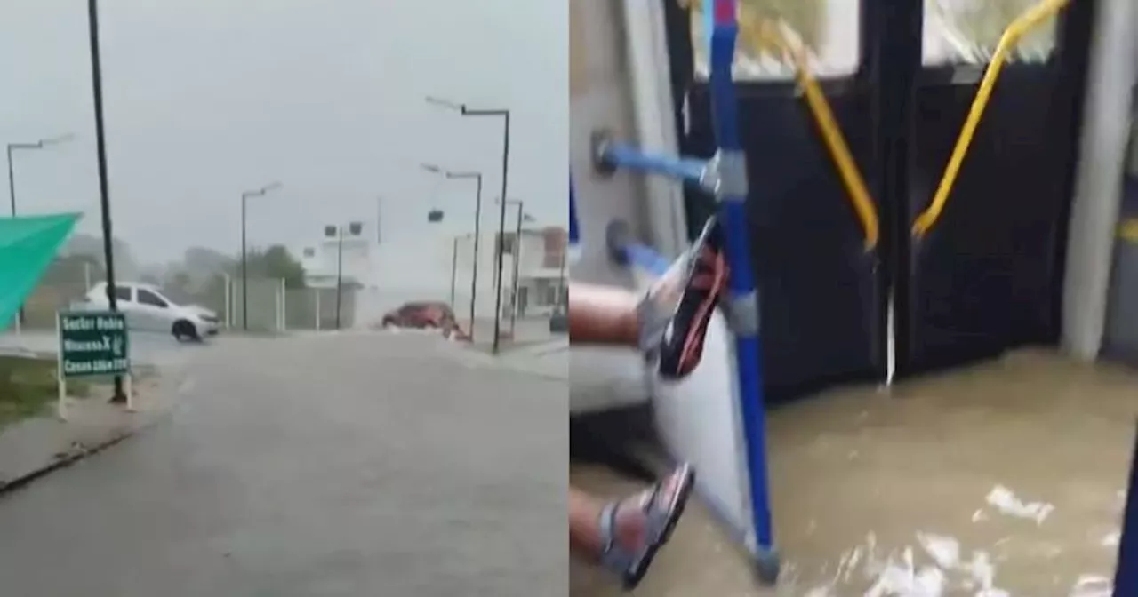 Bus de Transcaribe y calles inundadas por fuertes lluvias en Cartagena