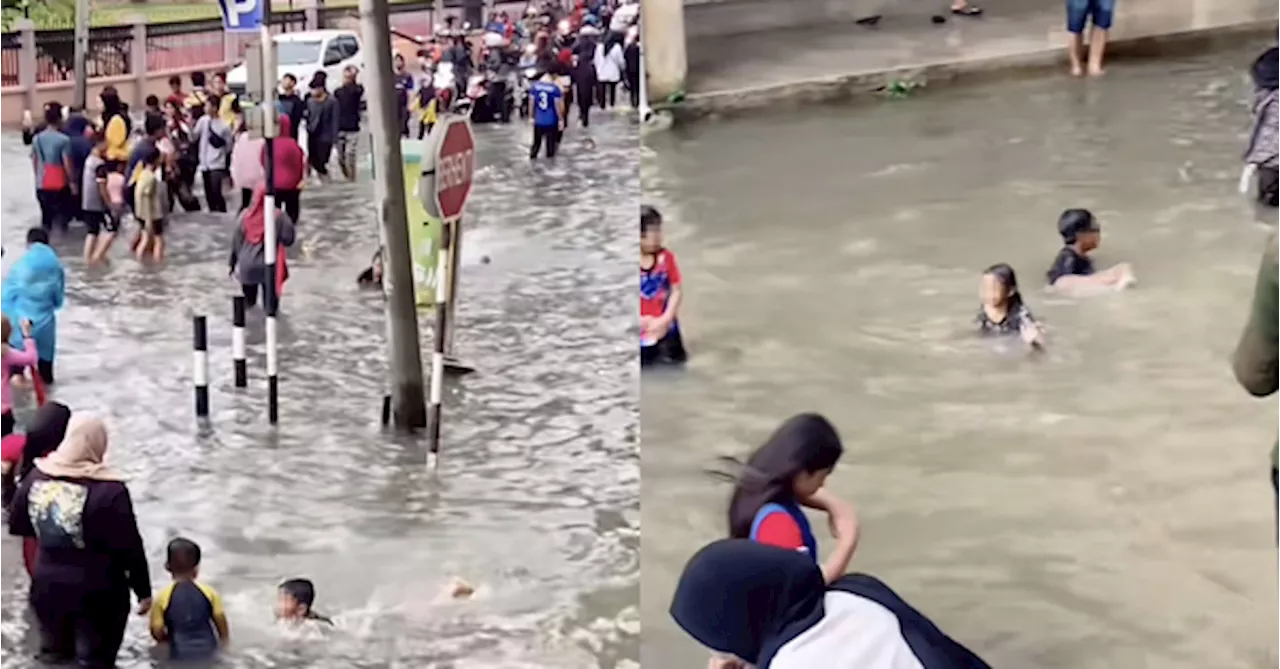 'Bahaya Leptospirosis' — Netizens Warn Families Against Treating Floods Like A Water Park