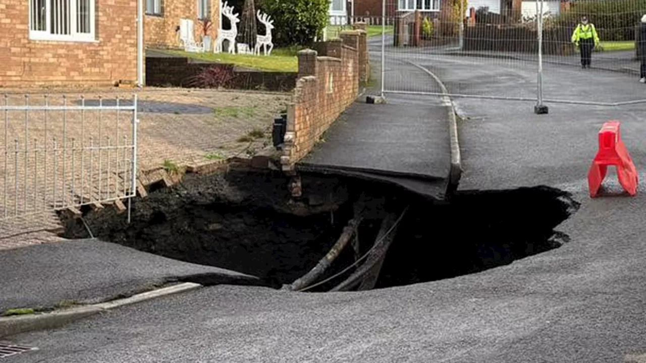 Large sinkhole opens up in South Wales as residents told to stay away