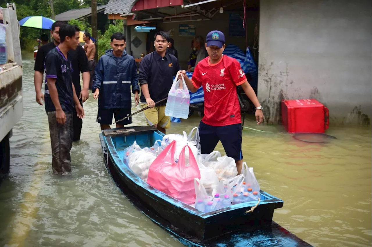 Death toll from Thai floods Jumps to 22 as more rain forecast in coming days