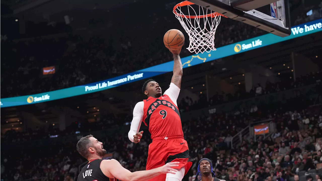 Barrett stays hot at home, Raptors hang on to beat Heat