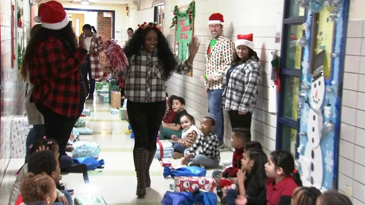 120 Back of the Yards elementary school students receive Christmas gifts through Operation Santa