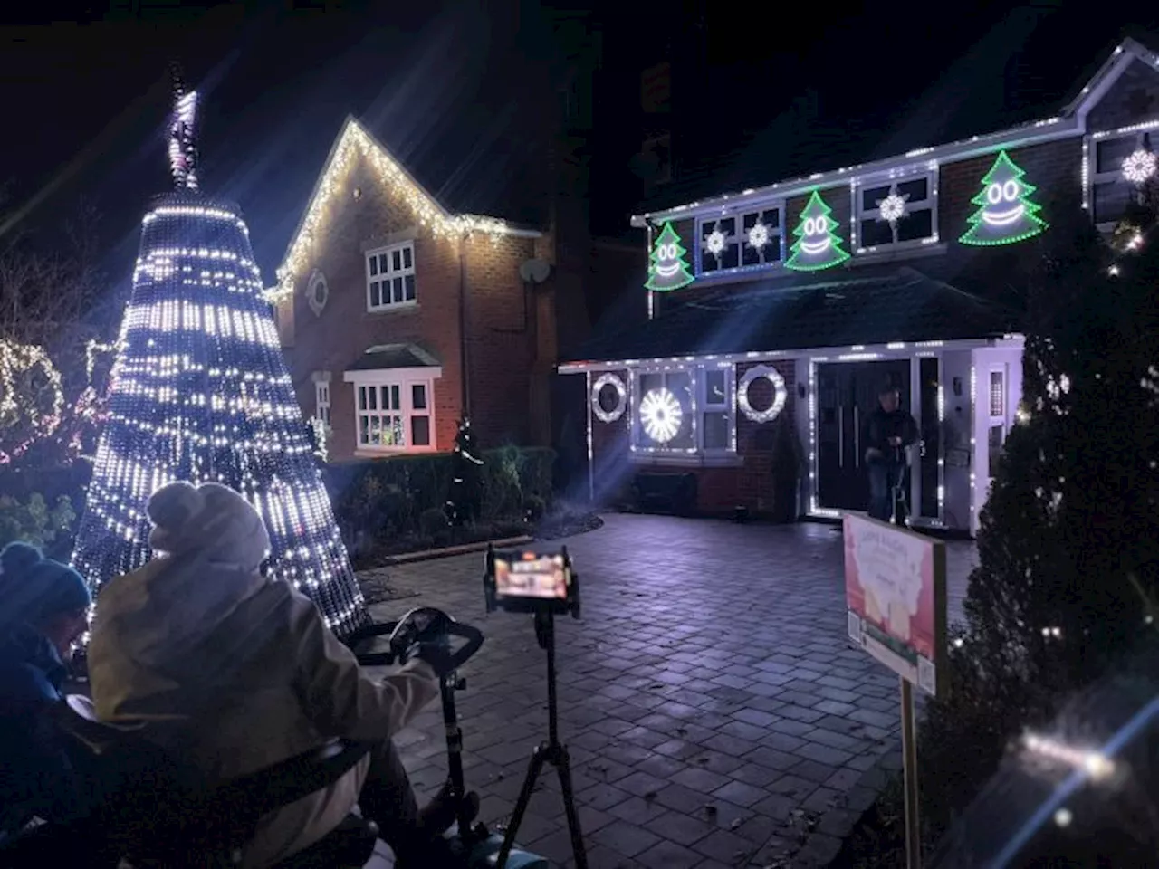 More than 16,000 ‘dancing Christmas lights’ light up village street