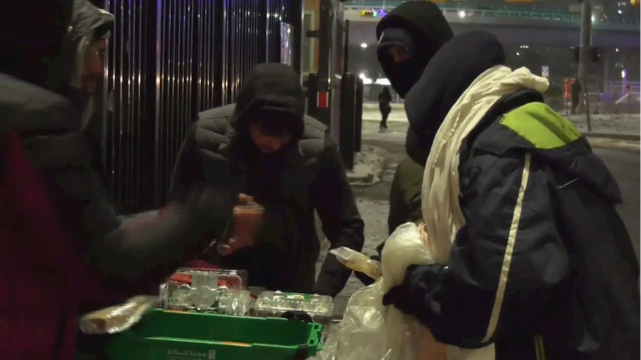 Muslim youth association hands out food outside the Calgary Drop-In Centre