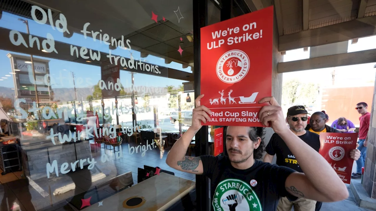 Starbucks workers begin strikes that could spread to hundreds of U.S. stores by Christmas Eve