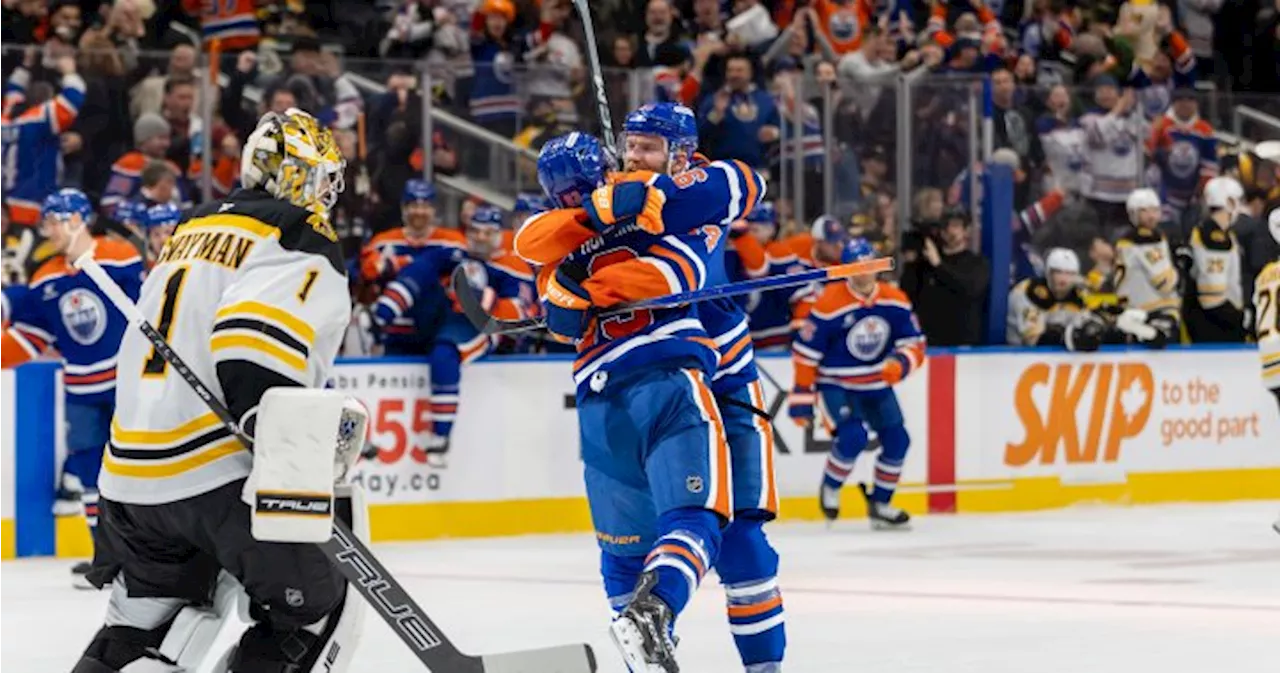 McDavid scores late in third period, Ekholm pots OT winner as Oilers top Bruins 3-2