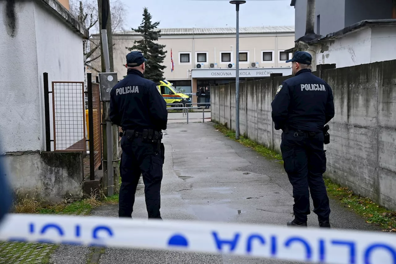 Croatian police say a girl died and six people were wounded in a knife attack in a school