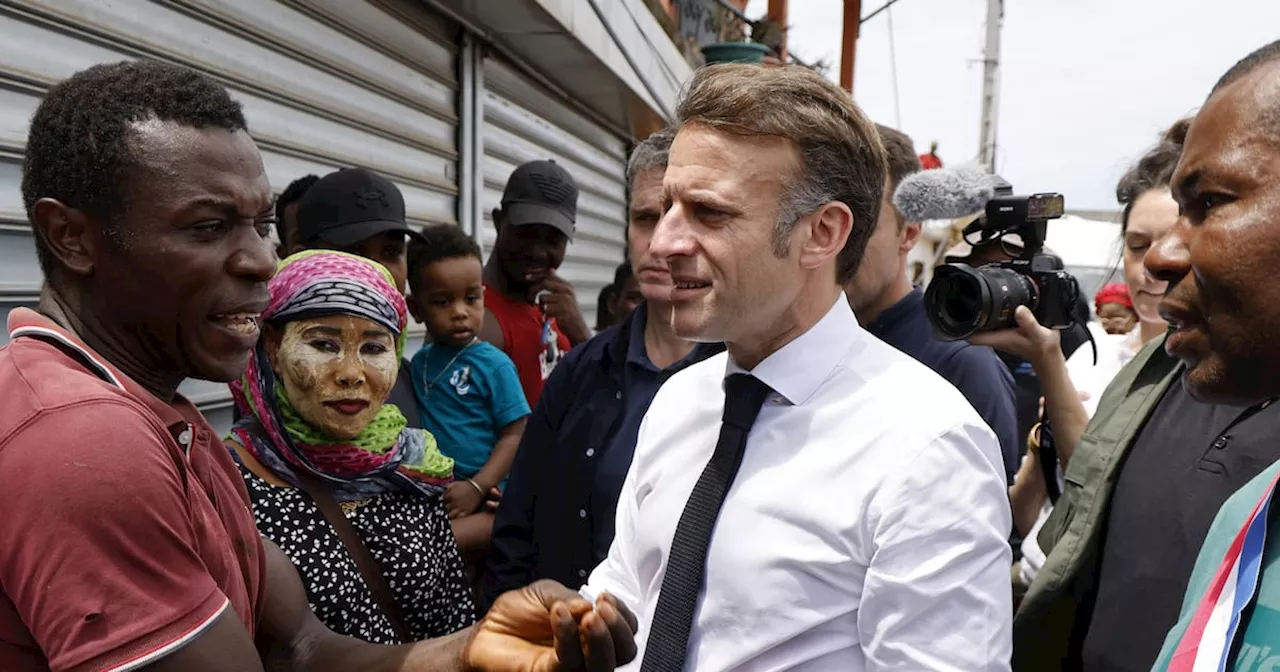 Macron in angry exchange with residents of cyclone-hit Mayotte