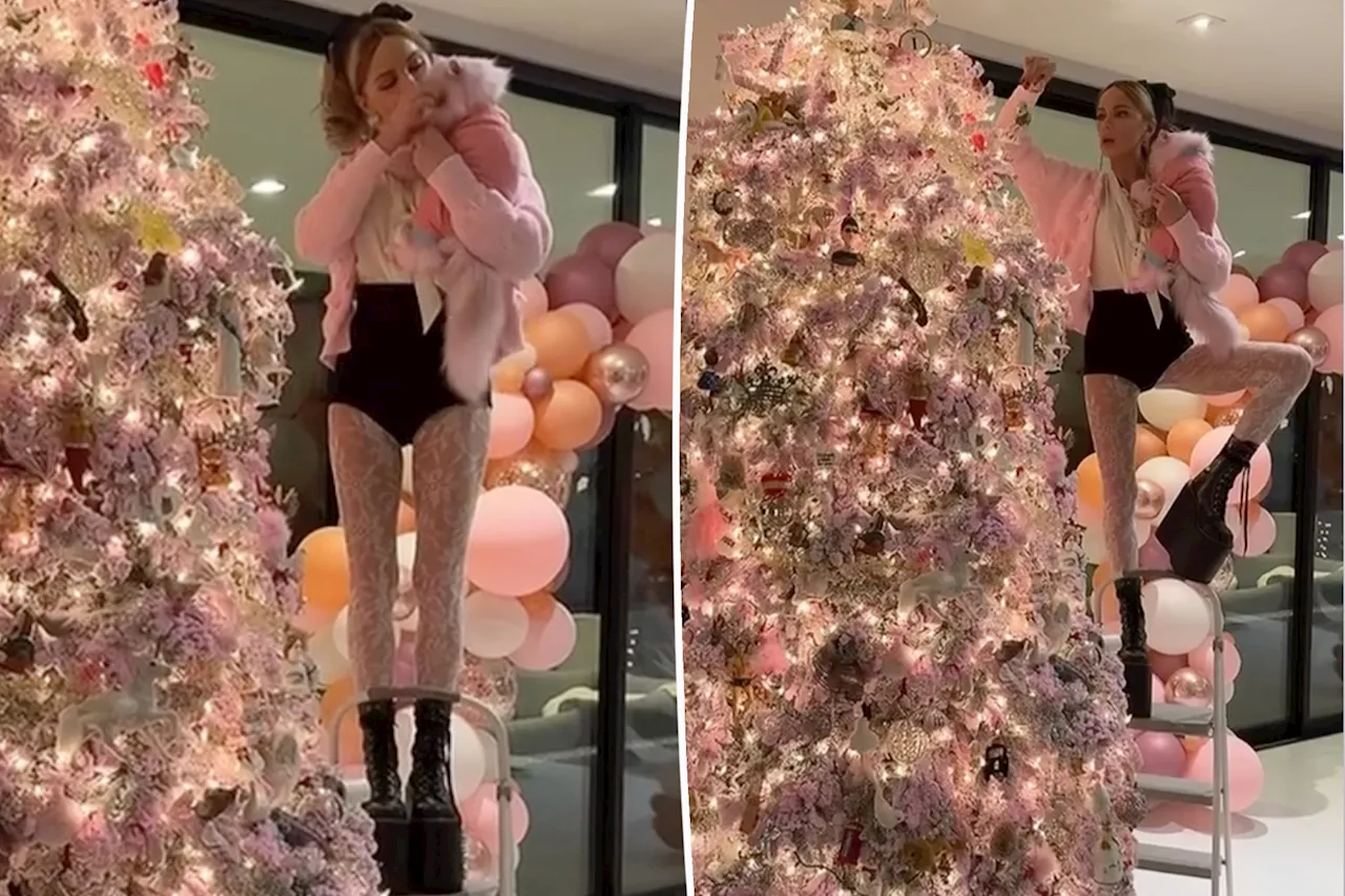 Kate Beckinsale decorates her Christmas tree in 8-inch platform boots: 'She does her own stunts'