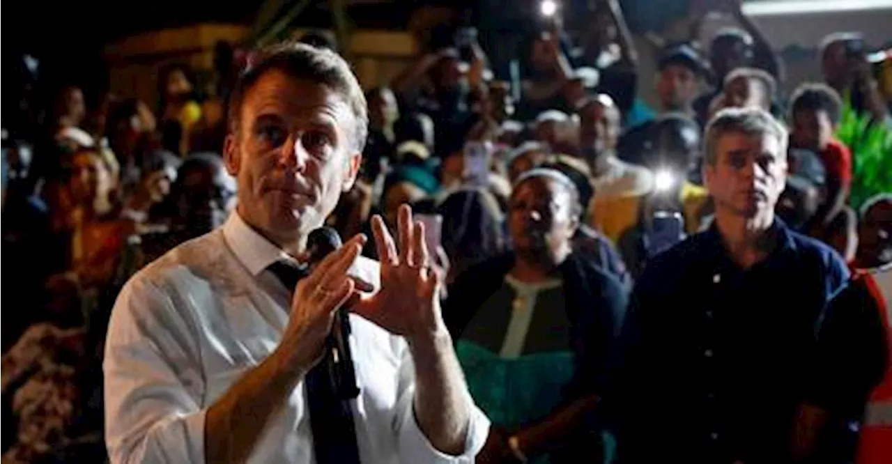 Macron extends visit cyclone-hit Mayotte after locals vent anger