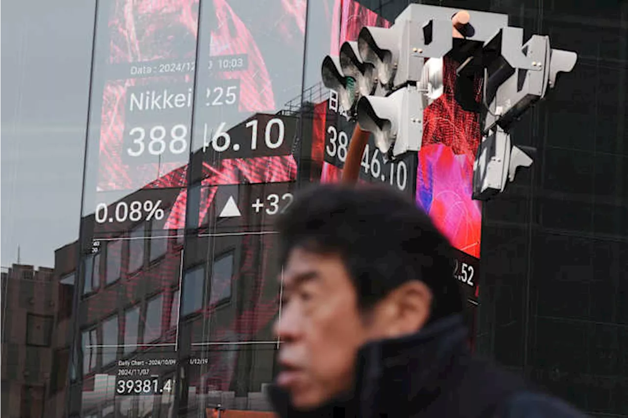 Asian Shares Mixed as Markets Await US Data