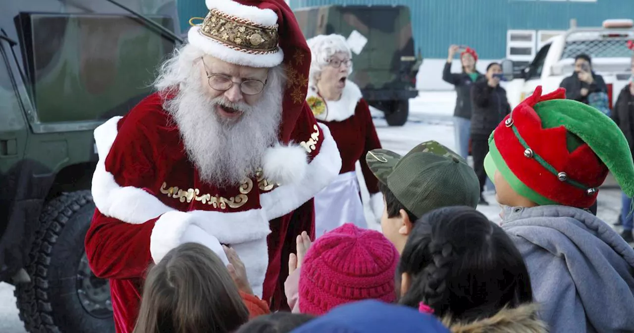 Santa and Mrs. Claus use military transports to bring Christmas to Yakutat